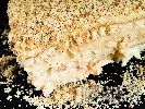 Рецепта Бисквитена торта без печене с натрошени обикновени бисквити закуска, крем ванилия и орехи